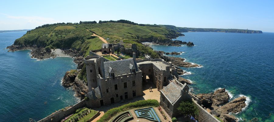 View over the Emerald Coast from Fort La Latte in Plévenon, with the Cap Fréhel peninsula and lighthouse